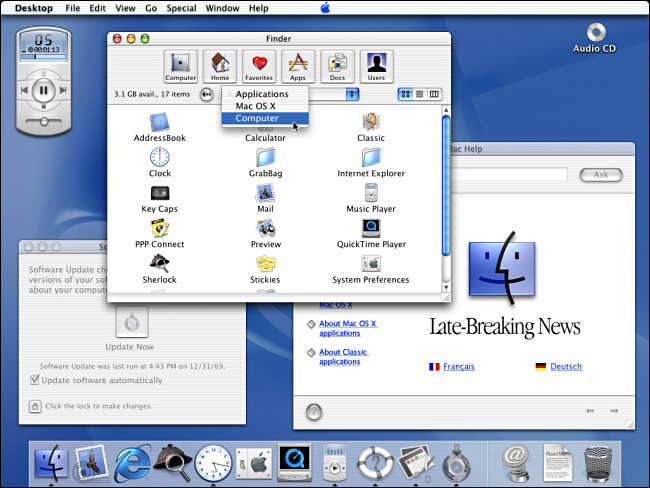 Plusieurs menus s'ouvrent sur un bureau Apple Mac OS X Public Beta.