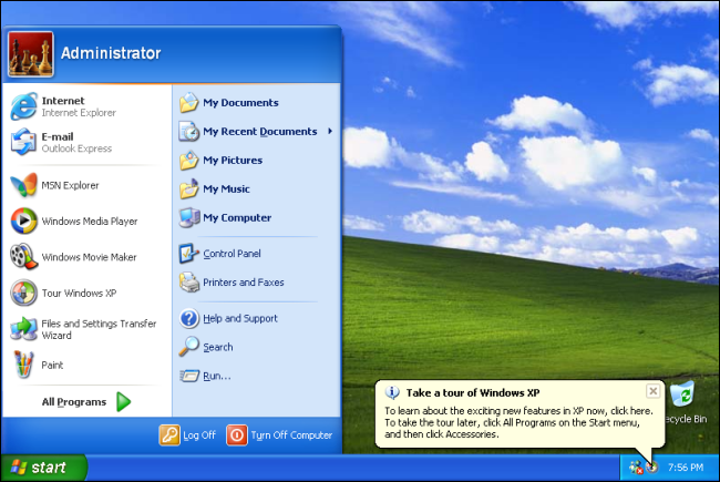 Le menu Démarrer sur un bureau Windows XP avec le champ vert et le fond de ciel. 