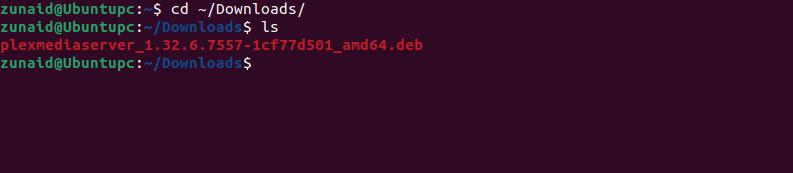 Terminal Linux affichant comment utiliser la commande cd pour accéder au répertoire Téléchargements