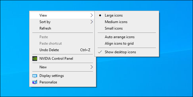 Choisir la taille de l'icône du bureau Windows dans le menu contextuel du bureau.